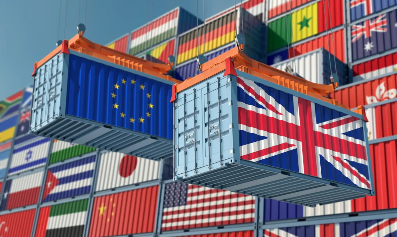How to Buy Villa Renovation Materials from China – Complete 2025 Guide 2 Shipping containers with international flags representing global logistics