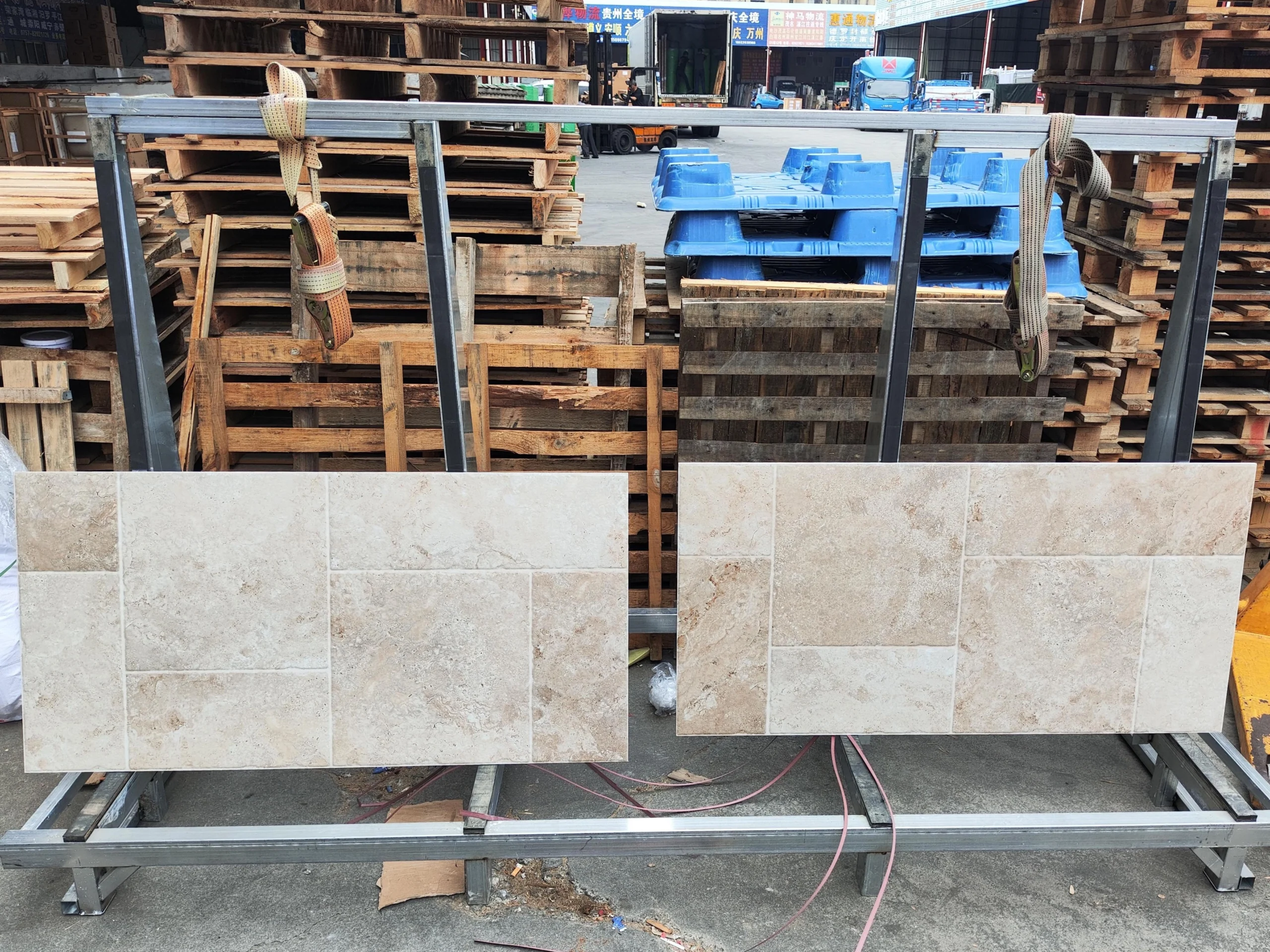 Tile Quality Control in China: How to Check Shade, Caliber, Flatness, Water Absorption and Packing 1 Beige stone-look tile samples displayed in two different layout patterns for comparison during building material sourcing in China.